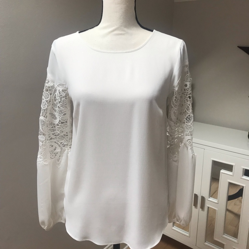 Ivory colored blouse top. Size XSP. New without tags.